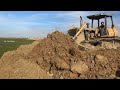 Super wonderful construction machinery bulldozer pushing dirt Vs beautiful dump truck unloading dirt