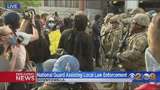 The national guard was in place sunday evening support of lapd as
protesters gathered on steps city hall downtown los angeles despite a
coun...