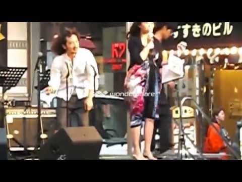 すすきの音楽祭2013/7/24　バンド演奏始まる前の女性司会者