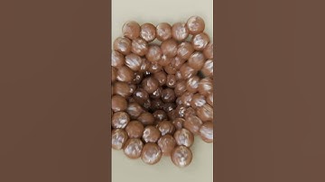 Chocolate Balls being sucked into a funnel that goes literally nowhere