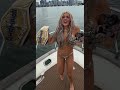 Tiffany Stratton flexing on a boat