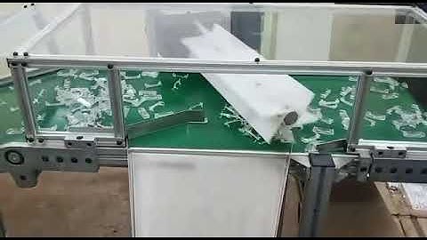 Orange Conveyor Systems - Part Sprue Paddle Seperator Conveyor