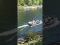 Small boat passes through Montlake Cut