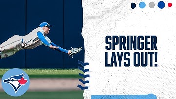 George Springer dives to make a tremendous late game catch!