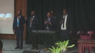 PNGBC Lae Outreach team presenting song at the PNG University of technology Exam dedication Service.