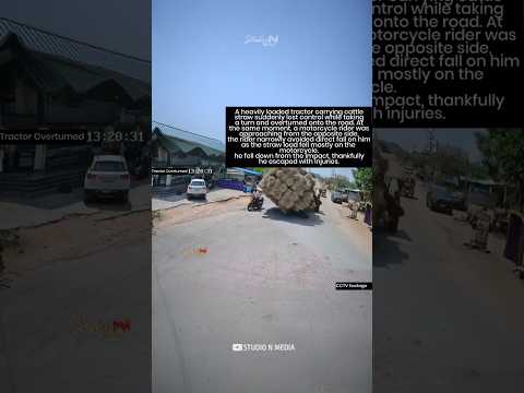 Out-of-Control Tractor Overturns with Heavy Load-Biker Injured 🚜 Always wear helmet #shorts #tractor