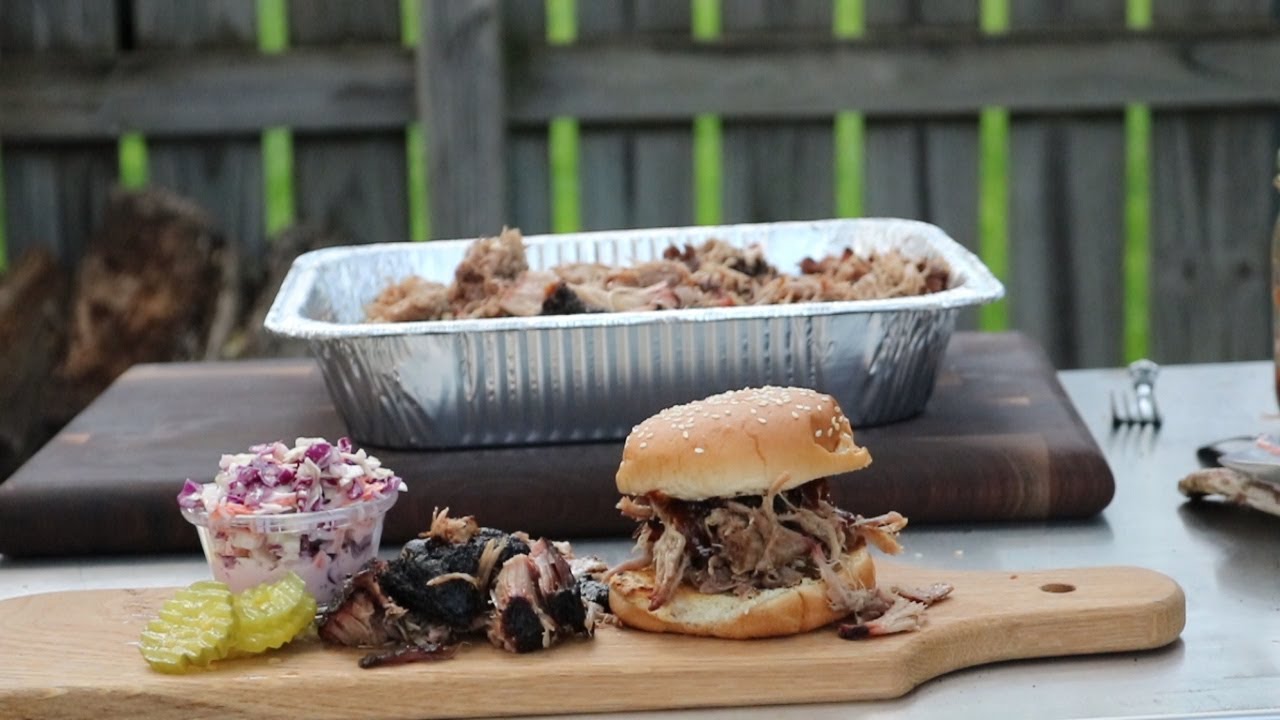 Real pit BBQ-all wood smoked garlic pulled pork. With Rowdy Roots BBQ