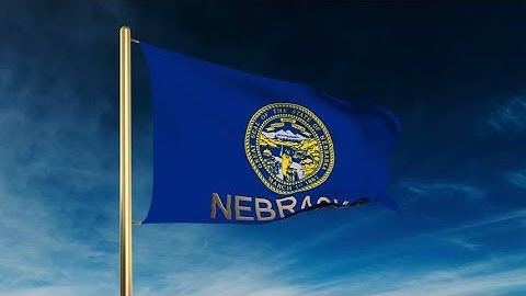 4K nebraska flag slider style with title. Waving in the wind with cloud background animation Stock