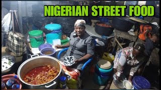 African street food tour at night Lagos Nigeria motorcylce adventure