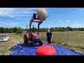 Giant 800 Pound Rubber Band Ball Vs Giant Water Balloon