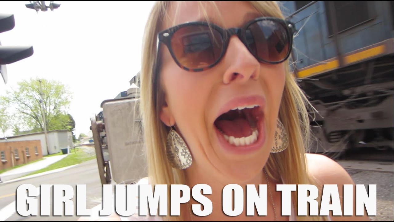 GIRL JUMPS ON TRAIN YouTube