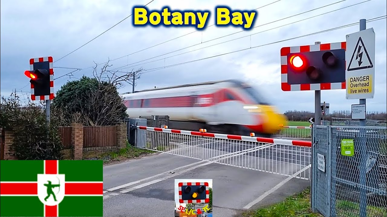 A Late-afternoon burst of trains at Botany Bay Level Crossing, Nottinghamshire