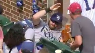 Longoria Falls Into the Stands - Watch as Rays 3B Evan Longoria chases a foul ball