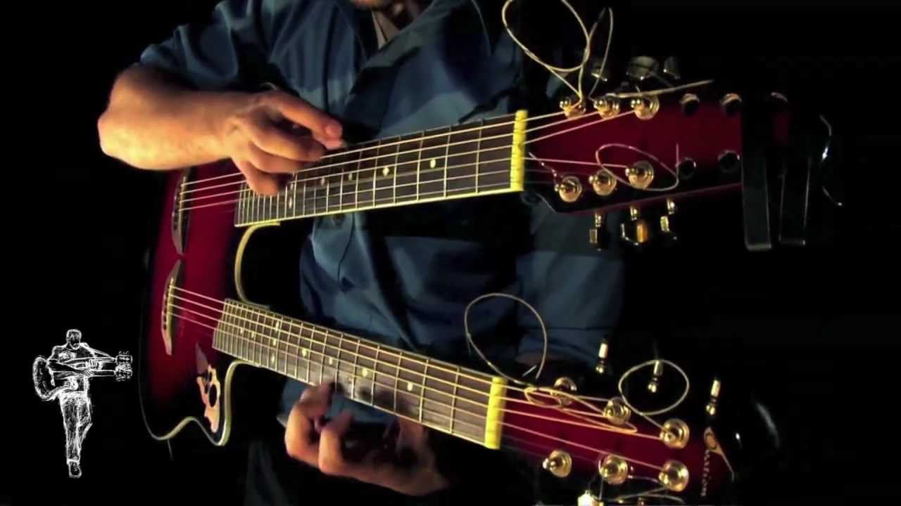 Double GuitarMark Kroos Plays Both Necks of Double Guitar at Once