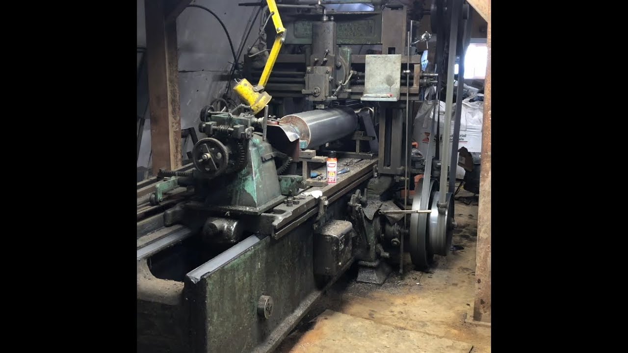 American Tool Works Metal Planer - Cutting helical teeth in grain rolls the old fashion way