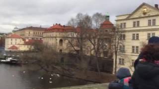 Walking Along Charles Bridge In Prague
