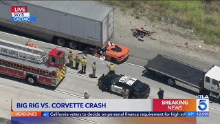 Driver hospitalized after sports car smashes into back of semitruck