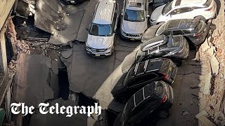 video: New York car park collapse: Concrete floors 'pancake' in packed multi-storey