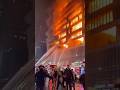 Firefighters Rush In: Emergency Crews Battle Flames After Missile Strike on Building