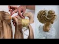 Penteado coque alto com entrelaçado de mechas