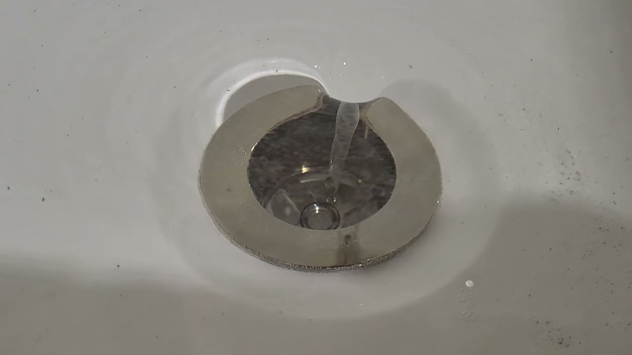 new bathtub, water down the drain