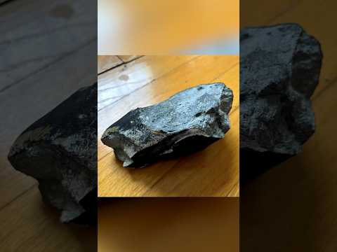 Mysterious rock crashes into home