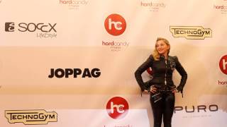 Madonna poses for press at the Hard Candy Fitness opening in Berlin October 17 2013