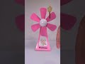 Fan with a flower shaped hair pin attached #kipasangin #shorts #fans
