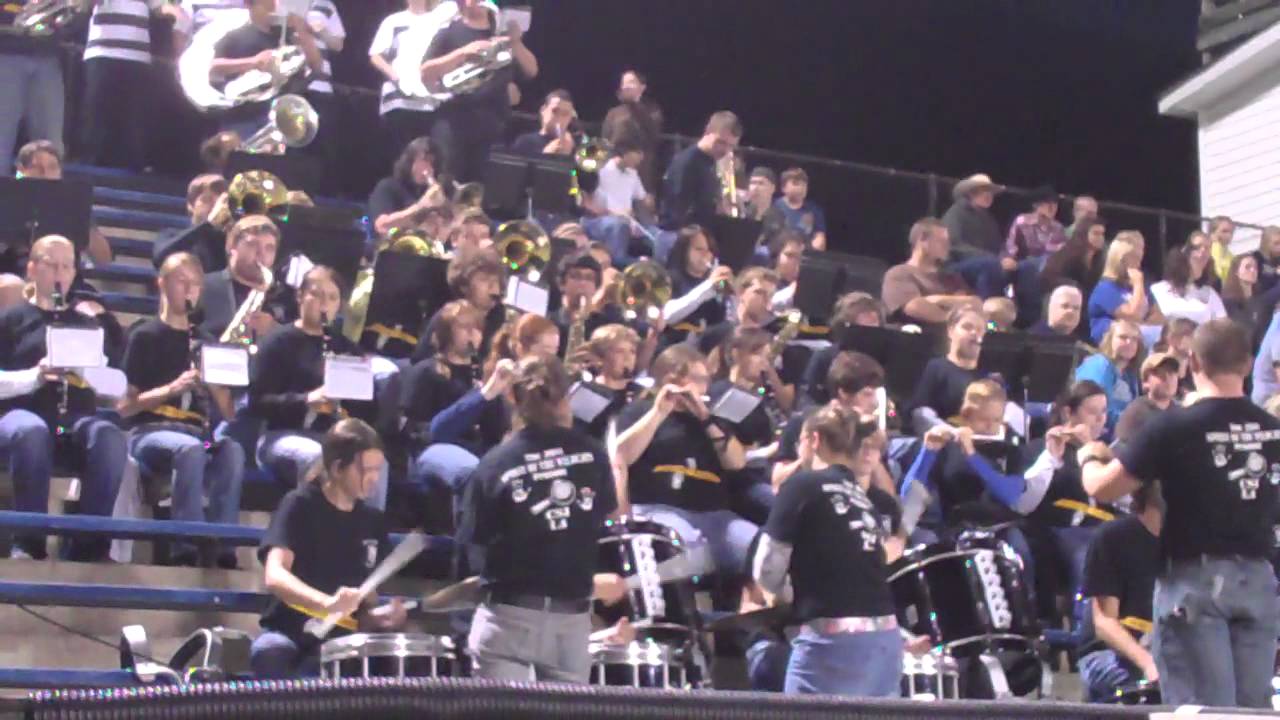 Band plays "Hang on Sloopy" while cheerleaders dance