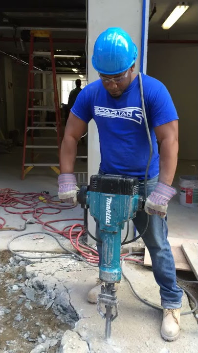 Concrete demolition using Makita Electric Jack Hammer