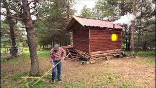 I'm building a log cabin on a windy day, my first home in the wilderness