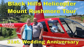 Celebrating our 31 wedding anniversary with a helicopter tour of Mount Rushmore.