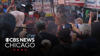 Protesters burn U.S. flag during protest outside Israeli Consulate in Chicago