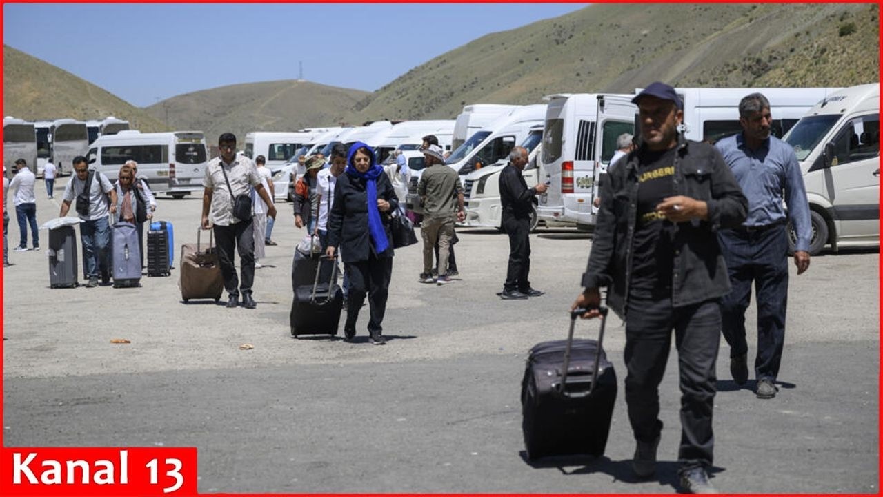 Iranians file across border with Turkey as war escalates, but they say they plan to go back