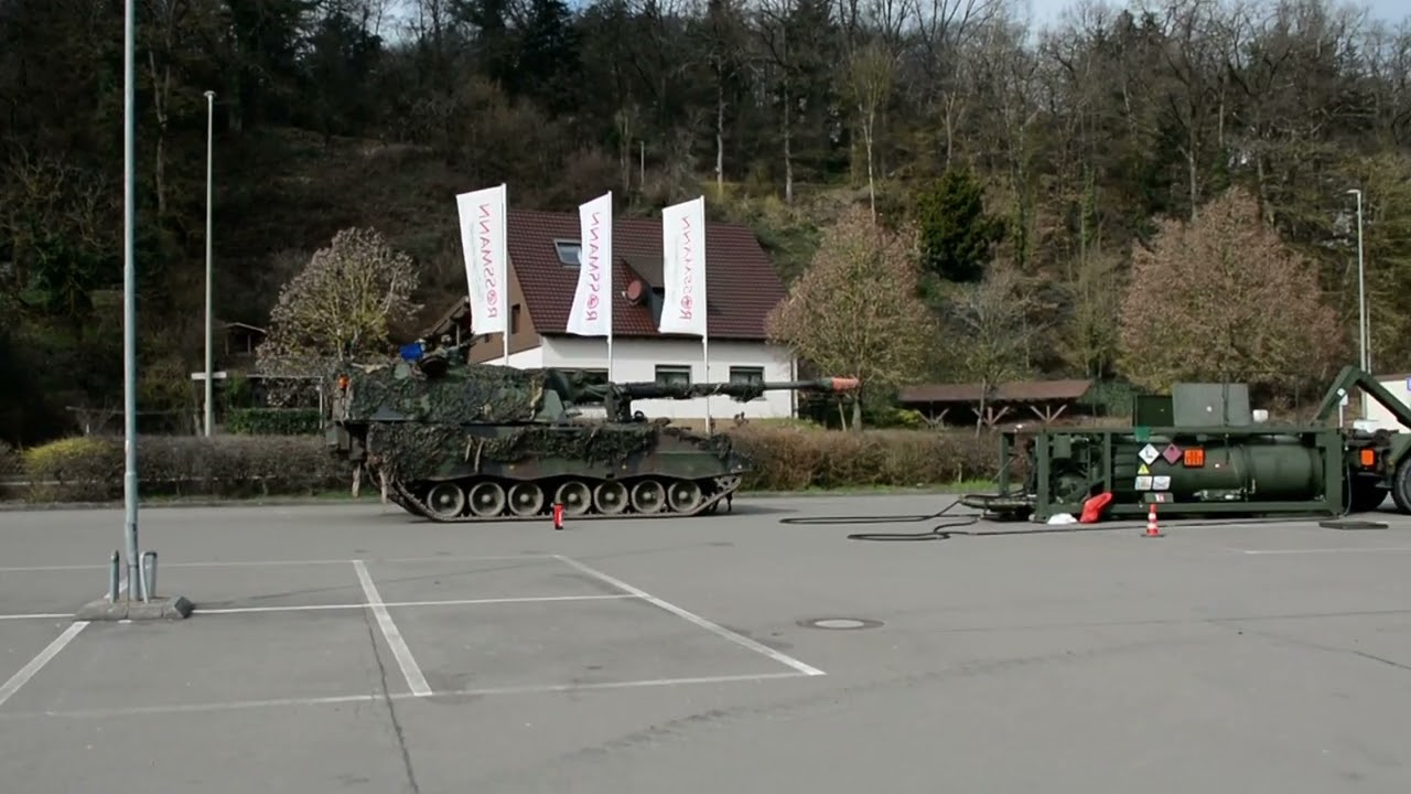 Pzh 2000 and Boxer ambulance drive to the refueling point during exercise Quadriga @ Lauterecken.