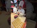 Filling Chinese Dumplings. Italy Street Food Festival