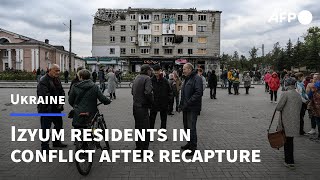 Conflicts arise among Izyum residents following recapture of Ukrainian city | AFP