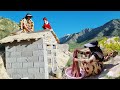 Life in the mountain: cementing the ceiling of the bathroom and toilet by Zari, a nomadic lady