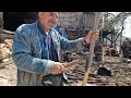 Village headmans skill making a scythe in an ancient iron workshop in 4k quality