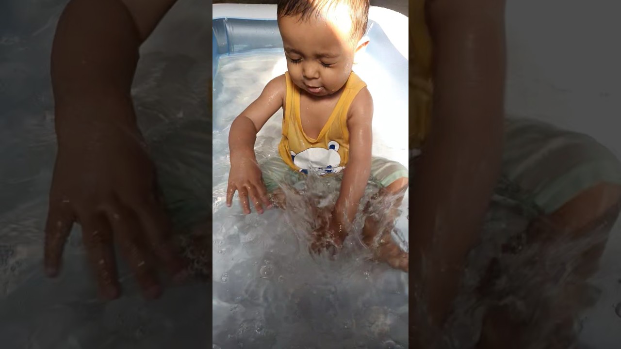 Cute Baby enjoying bath in a tub🛁