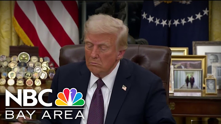 President Donald Trump signs executive orders