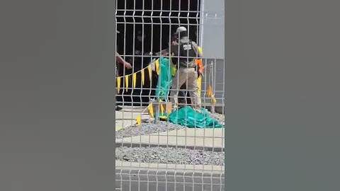Worker being detained