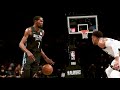Kevin Durant crosses Giannis  Antetokounmpo in slow motion.