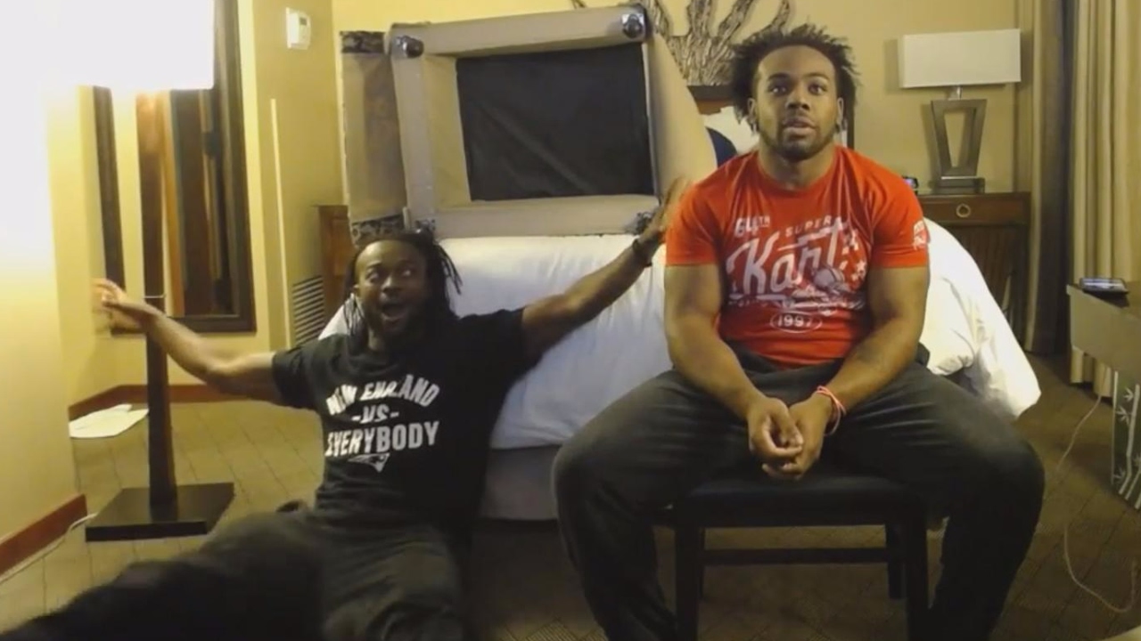 Kofi Kingston & Xavier Woods anxiously watch the Super 