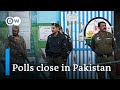 Pakistan election clouded by violence suspension of mobile services  dw news