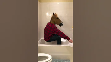 Man-horse Plays "Sweet Child O' Mine" on a Bucket in a Shower