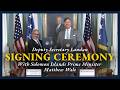 Deputy Secretary Landau at a Signing Ceremony with Solomon Islands Prime Minister Matthew Wale