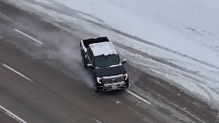 Sliding car narrowly misses firefighter on icy St. Louis interstate