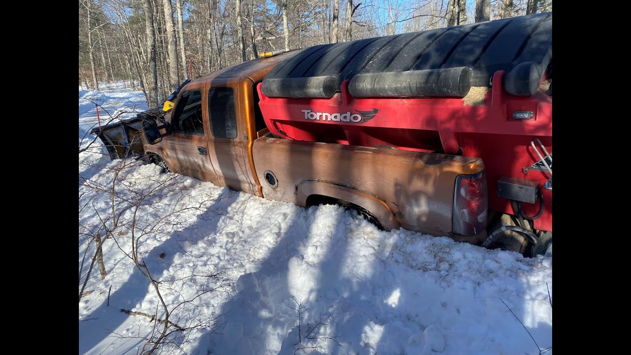 Snow plowing long, steep, slanted, curved driveway (Kristin) 15 hrs