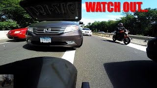 Motorcycle almost hit by car...